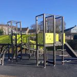 Multiplay unit showing climbing nets and curved bridge