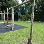 Trapeze ring section with timber posts and grass mats